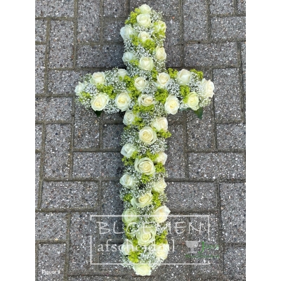 Kruis van witte en groene bloemen